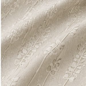 Vertical floral jacquard fabric texture close-up