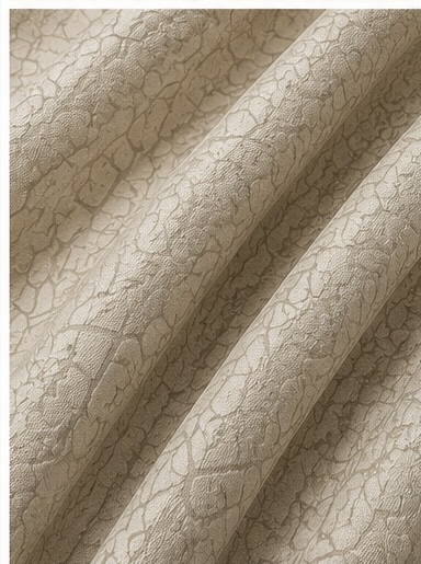 Beige jacquard fabric drape with textured pattern