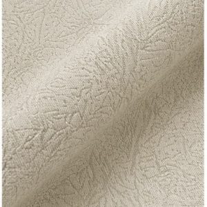 Botanical jacquard fabric texture close-up